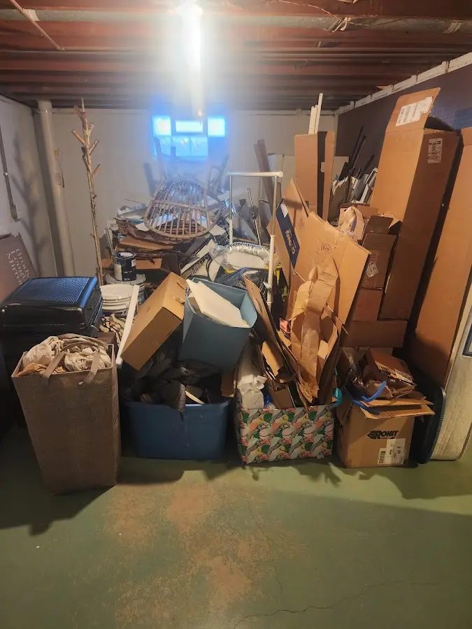 Roll-off dumpster container at job site for 2 Yard Dumpster Rental in Lindale